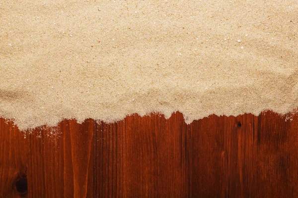 Areia sobre madeira pranchada — Fotografia de Stock