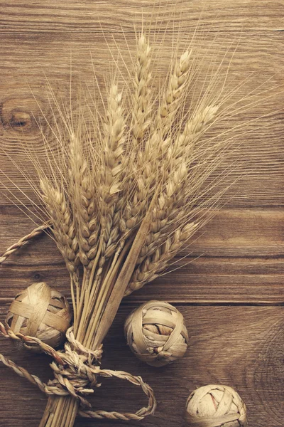 Wheat on the wood background — Stock Photo, Image