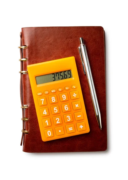 Calculadora pluma y cuaderno — Foto de Stock