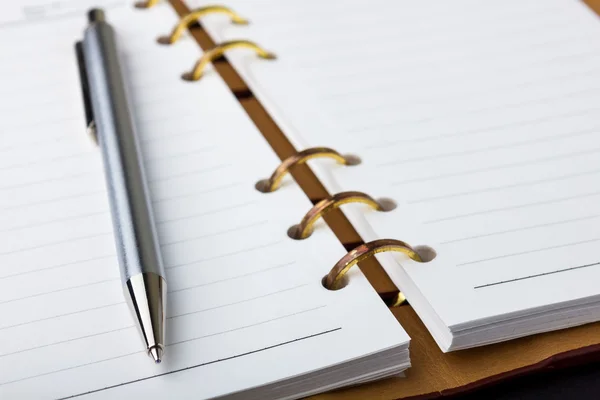 Open notebook and pen — Stock Photo, Image