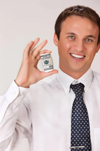 Portret Młodego Mężczyzny Trzymającego Dolary Odosobnionym Tle — Zdjęcie stockowe