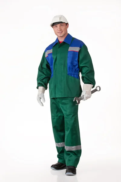 Mann in Uniform mit Schraubenschlüssel — Stockfoto
