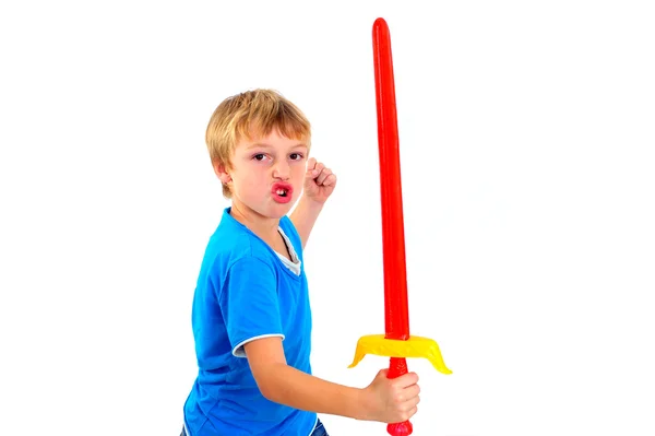 Jovem no estúdio brincando com espada no fundo branco — Fotografia de Stock