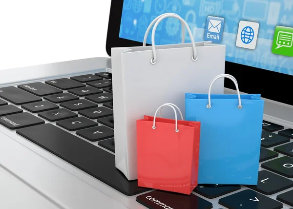 laptop and shopping bags