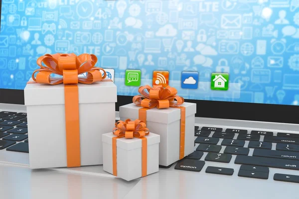 Gift boxes on laptop