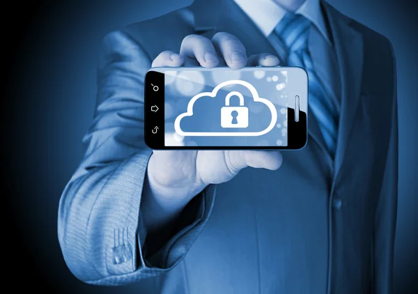 Man holds smart phone with cloud security