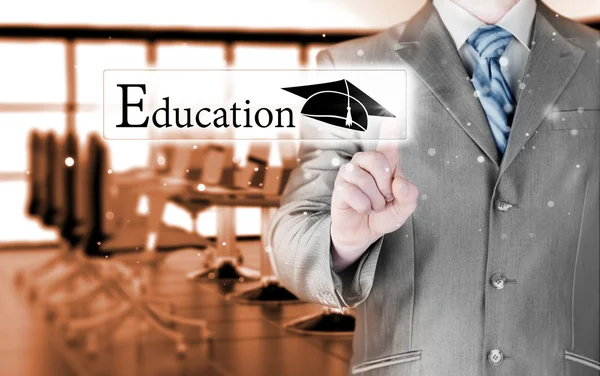 business man pointing education concept