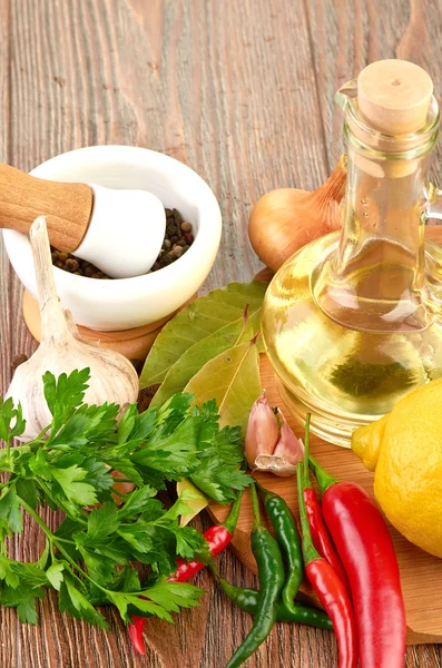 Fresh cooking ingredients with olive oil