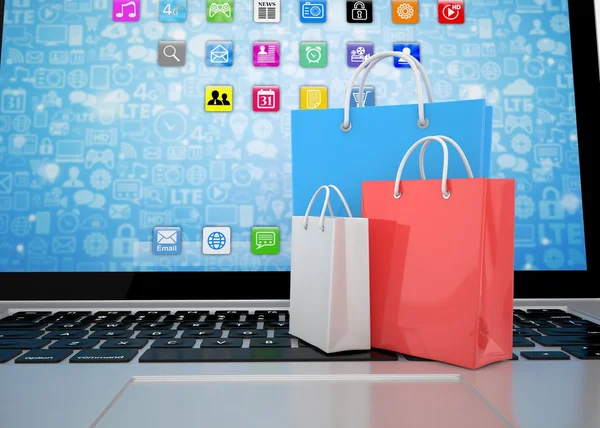 laptop and shopping bags