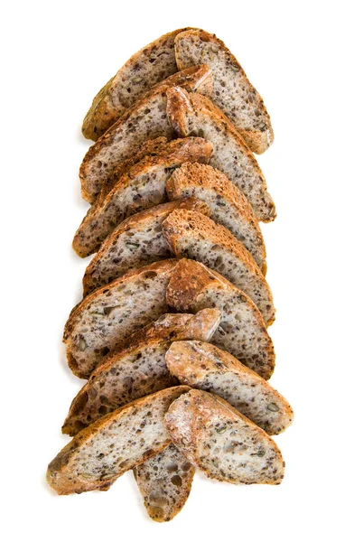 Segmenten van Alpine stokbrood in de vorm van kerstboom op wit. — Stockfoto
