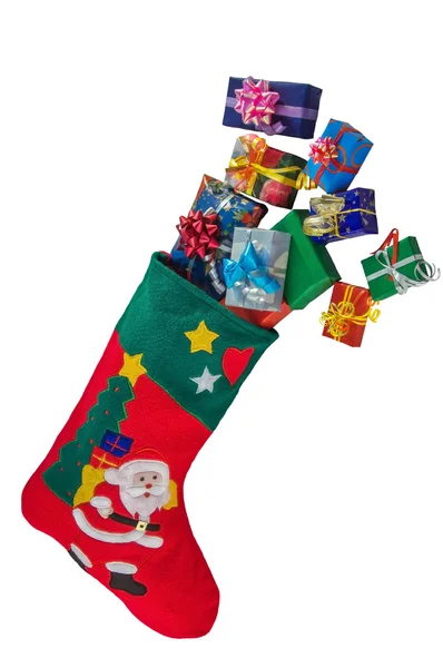 Christmas stocking en geschenken geïsoleerd over Wit. — Stockfoto