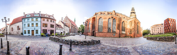 Skyline of Riga old Town. Small Square with Old houses near the St. Peter and St. Johns Churches. Panoramic montage of 41 HDR image