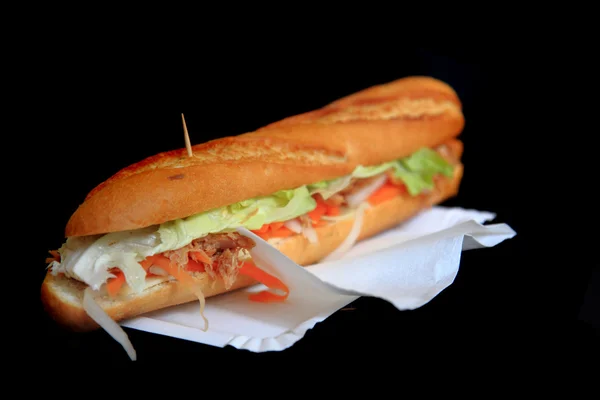 Baguette on the black background — Stock Photo, Image