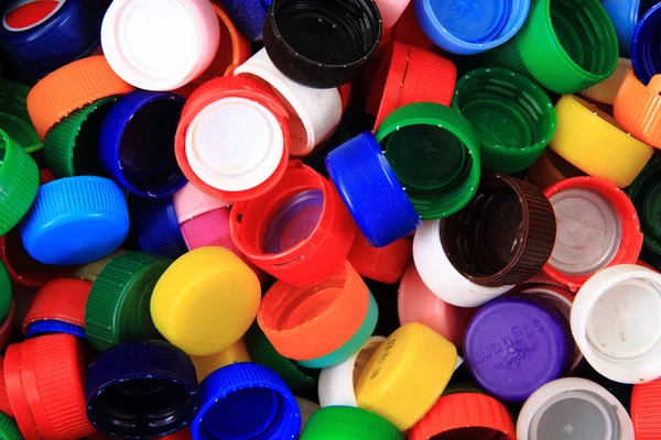 Renkli plastik kapaklar arka planı — Stok fotoğraf