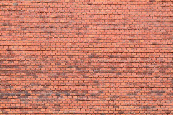 Gammal vägg med röda tegelstenar — Stockfoto