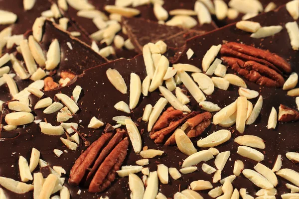 Chocolate with nuts and almonds — Stock Photo, Image