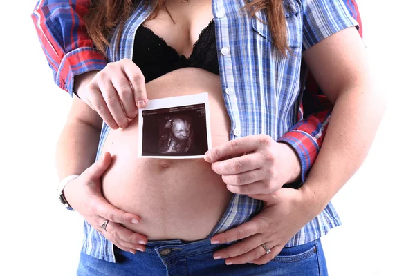 Zwangerschap vrouw met echografie foto — Stockfoto