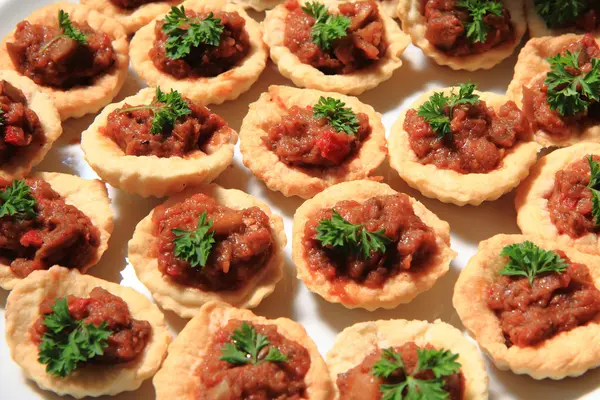 Raw meat with salted cookies — Stock Photo, Image