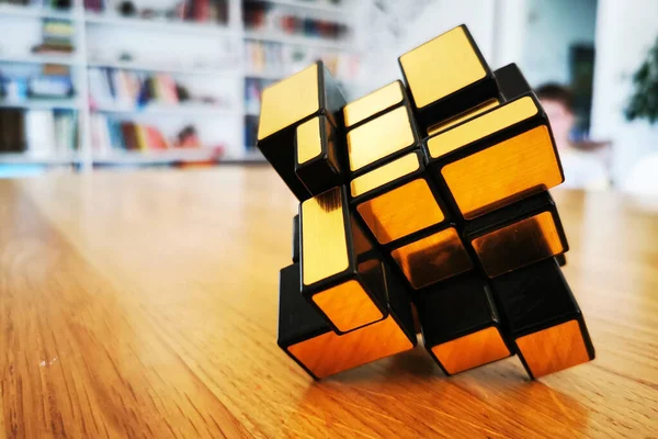 mechanical puzzle cube on the table in the office