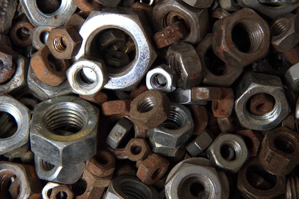 Steel nuts as nice beackground — Stock Photo, Image