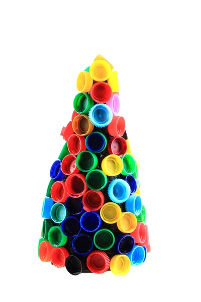 Árvore de Natal de tampas de plástico de cor — Fotografia de Stock