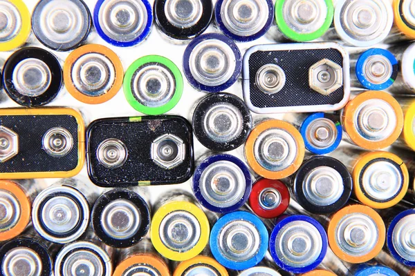 Old batteries background — Stock Photo, Image