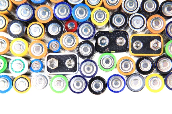 Old batteries background — Stock Photo, Image