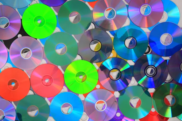 Color DVD and CD background — Stock Photo, Image