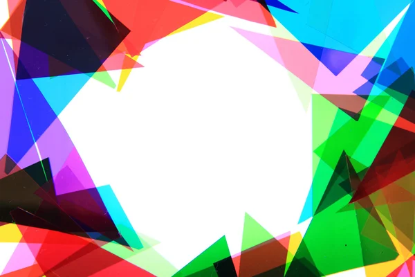 Color plastic triangles background — Stock Photo, Image