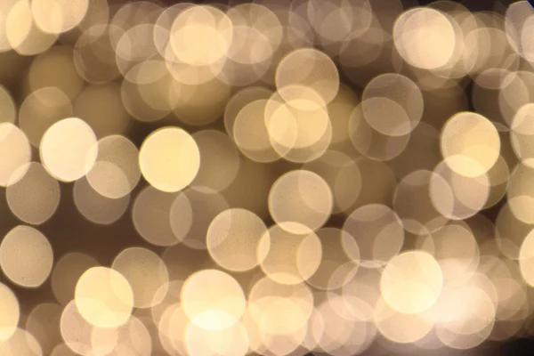 Golden christmas lights background — Stock Photo, Image