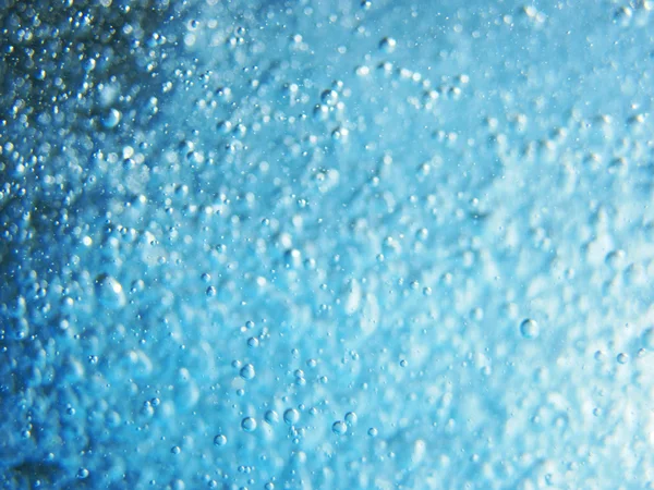 Blue water with oxygen bubbles texture — Stock Photo, Image