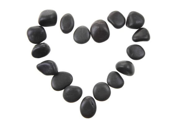 Corazón de las piedras negras aisladas —  Fotos de Stock