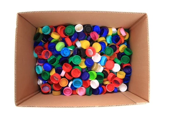 Pet caps in the paper box — Stock Photo, Image