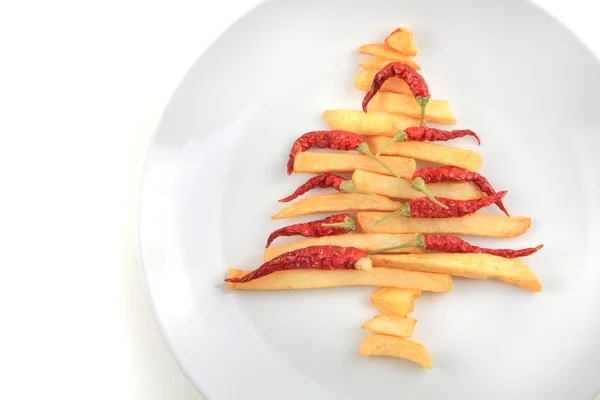 Τηγανητές πατάτες ως χριστουγεννιάτικο δέντρο Εικόνα Αρχείου