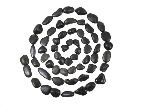 Black stones spiral isolated — Stock Photo, Image