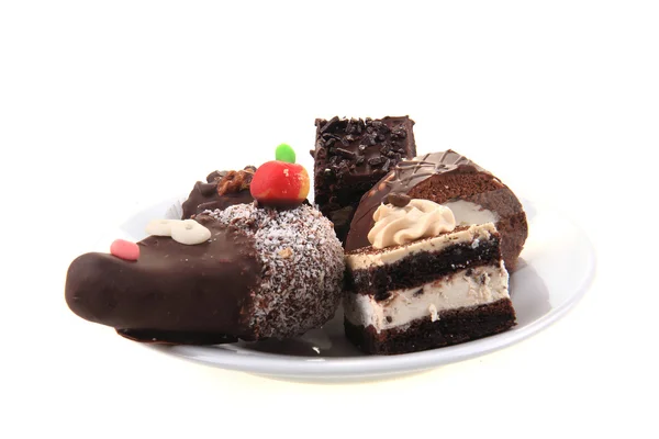 Słodkie desery na białym tle — Zdjęcie stockowe