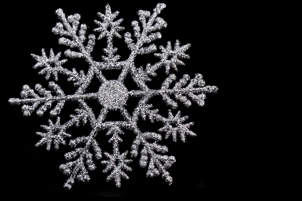 Silver snöflinga isolerade — Stockfoto