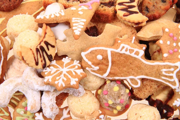 Рождественские печенье в качестве фона — стоковое фото