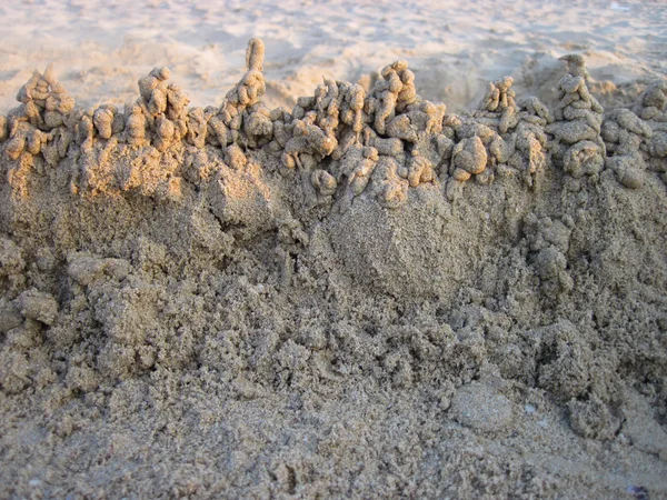 Kumsaldaki kumdan kale — Stok fotoğraf