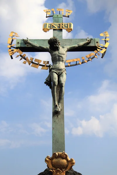 Crucifix and blue sky Royalty Free Stock Images