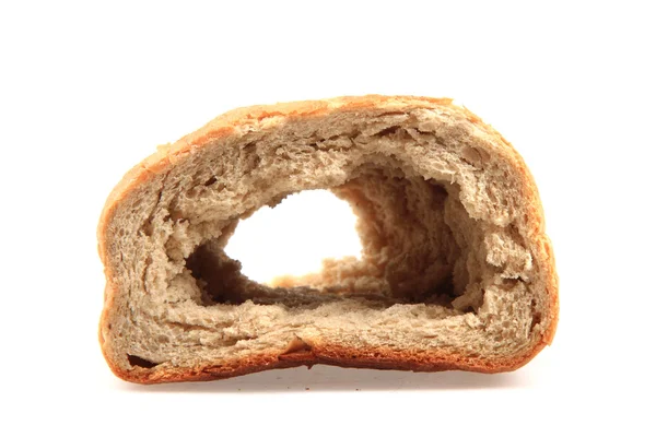 Старый сухой хлеб с отверстием — стоковое фото