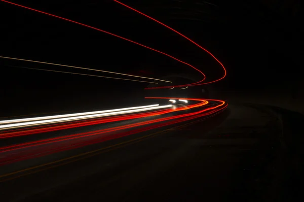 Luces de coche interesantes y abstractas en naranja — Foto de Stock