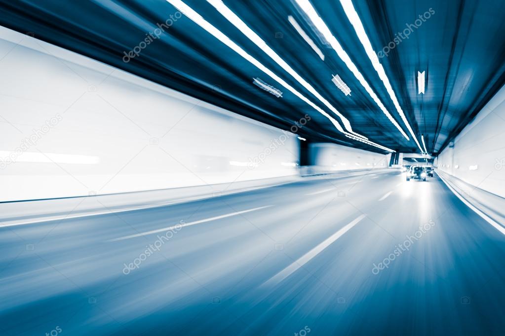 Blue color tunnel car driving motion blur