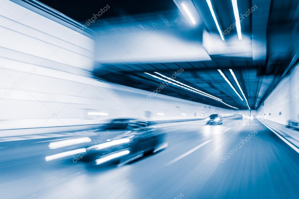 Blue color tunnel car driving motion blur