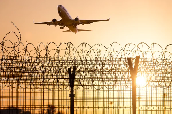 Airplane left the airport. — Stock Photo, Image