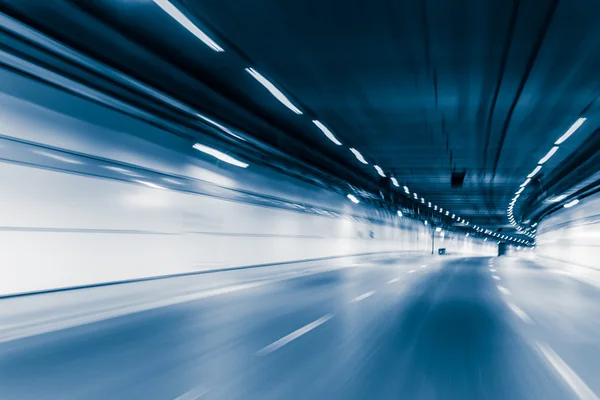 Blue color tunnel car driving motion blur — Stock Photo, Image