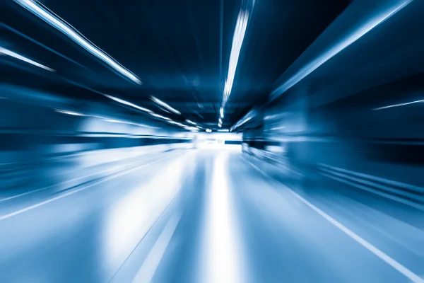 Blue color tunnel car driving motion blur — Stock Photo, Image