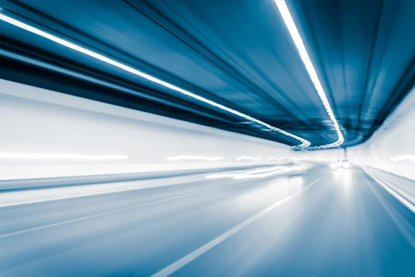 Blue color tunnel car driving motion blur — Stock Photo, Image