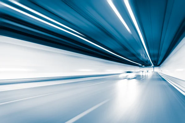 Blue color tunnel car driving motion blur — Stock Photo, Image