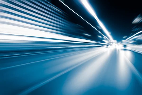 Blue color tunnel car driving motion blur — Stock Photo, Image